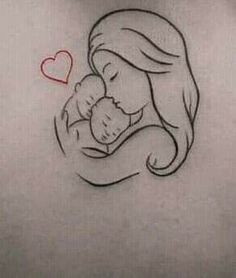 a woman with a tattoo on her back holding a baby