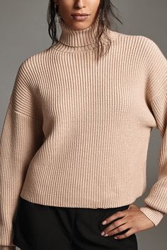 Has sweater weather ever looked (and felt) this good? The Good American Cozy Ribbed Turtleneck features a slightly oversized fit and a rolled turtleneck design, rendered in a plush knit fabric. | Cozy Ribbed Turtleneck Sweater by Good American in White, Women's, Size: Medium, Polyester/Nylon/Viscose at Anthropologie American Cozy, John Proctor, Oversized Turtleneck, Ribbed Turtleneck Sweater, Ribbed Turtleneck, Good American, 50 Fashion, White Sweaters, Sweater Weather