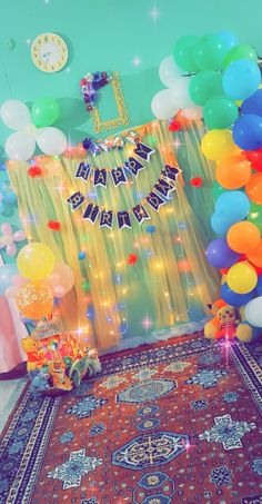 a birthday party with balloons and streamers