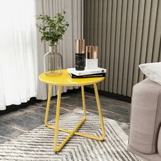 a yellow side table in a living room