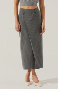 Polished pinstripes take on a jaunty attitude in a straight skirt cut in an off-center silhouette. 34" length (size Medium) Front button closure Front slant pockets Unlined 87% polyester, 10% rayon, 3% elastane Dry clean Imported Chic Pinstripe Skirt For Work, Striped Midi Skirt For Work, Striped Lined Skirt For Workwear, Striped Lined Skirt Bottoms For Workwear, Striped Fitted Midi Skirt, Pinstripe Vertical Stripes Skirt For Work, Striped Relaxed Fit Midi Skirt, Striped Fitted Long Skirt, Fitted Striped Pencil Skirt