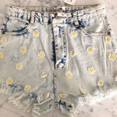 Light Blue Jean Shorts With Flowers In The Front. Never Worn With Tags. Fringe At The Bottom. Great For Festivals And Summer Days! Fitted Yellow Denim Bottoms, Blue Cotton Jean Shorts For Spring, Cute High Waist Bottoms For Spring, Spring Blue Cotton Jean Shorts, Cute Yellow Summer Shorts, Yellow High-waisted Jean Shorts For Summer, Trendy High Waist Yellow Jean Shorts, Cute Light Blue Bottoms For Summer, Cute Light Blue Summer Bottoms