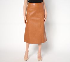 Go from the office to an evening out (and maybe even stop at happy hour in between) effortlessly wearing this faux leather midi skirt. A stunning style statement that fits in fabulously at any social scene, this is the luxe look you've been waiting for! From Studio Park x Ali Carr. Faux Leather Midi Skirt, Stunning Style, Leather Midi Skirt, Style Statement, Happy Hour, The Office, Dress Skirt, Midi Skirt, Fashion Dresses