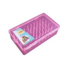 a pink plastic container with dividers on the bottom and sides, filled with crayons