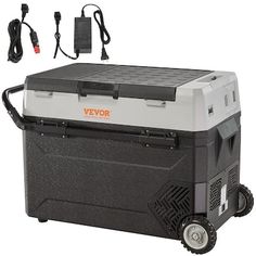 an image of a cooler with wheels and charger on the back for powering up