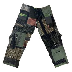 Waist- Max 51.5in (Adjustable)  Length- 44.5in Baggy Earth toned cargo patchwork pants with a drawstring tie in the inside front. 2 front pockets and 2 side pockets with lids. 2 crossed chains on each side. 100% handmade from upcycled fabric. Handwash for best results. Patchwork Cargo Pants, Masc Style, Patchwork Pants, Oc Outfits, Upcycled Fabric, Oogie Boogie, Green Pants, Pants Pattern, Cargo Pants