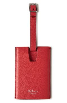 Add a personalized touch to your luggage with this leather tag featuring a foil-embossed logo and an interior window sleeve for your contact information. Buckle closure Clear interior sleeve for personal info Leather Imported Designer Handbags Rectangular Leather Luggage Tag, Luxury Leather Luggage Tag With Sleeve, Luxury Rectangular Luggage Tag With Sleeve, Red Rectangular Luggage Tag, Interior Window, Hibiscus Red, Leather Luggage Tag, Interior Windows, Leather Luggage Tags