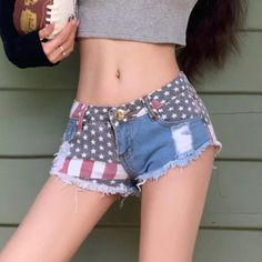 Stand out in these USA American flag denim shorts! Made with soft denim, these shorts are perfect for showing off your patriotic spirit. With their comfortable fit and trendy style, these shorts are sure to become a staple in your wardrobe. Add them to your summer collection now! American Flag Jeans, Flag Jeans, Streetwear Chic, Flag Pattern, Low Waist Jeans, Shorts Denim, New Pant, Shorts Jeans, Trendy Style