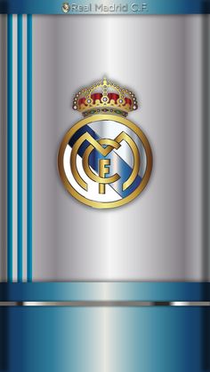 the real madrid crest is shown on a metallic background with blue stripes and gold trim