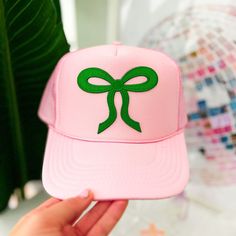 Looking for a way to add some personality to your outfit? Trucker hats are the perfect solution! With fun colors and embellishments, they'll help you stand out from the crowd. Plus, they're perfect for those days when you just can't be bothered to style your hair. Most importantly, they're super comfortable, so you can wear them all day long. Green Novelty Party Hat, Trendy Party Hat, One Size Fits Most, Casual Snapback Party Hat, Trendy Party Hats One Size Fits Most, Casual Mini Hats With Flat Brim For Party, Cute Flat Brim Hat One Size, Casual Party Trucker Hat, Casual Mini Hat With Flat Brim For Parties, Funky Adjustable Party Hats