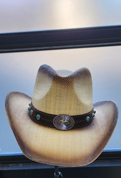 O/S This cowboy hat is made with 100% Straw Western Style Sun Hat With Curved Brim, Western Brimmed Sun Hat, One Size Fits Most, Adjustable Western Fedora, Western Style Panama Hat With Flat Brim, Western Brimmed Hat, Western Brimmed Hat One Size Fits Most, Wide Brim Sun Hat For Western-themed Events, Western Brown Panama Hat One Size, Rustic Hats For Rodeo