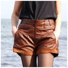 Women's high-waisted, cuffed shorts with a front zipper closure and side pockets.  Model height- 169cm Measurements: Length: 36 cm/14.2" Waist: 74 cm/29.1" Hips: 95 cm/37.4" Size - M EUR 38 Good vintage condition. High Waist Fitted Shorts With Zipper Closure, Fitted High Waist Shorts With Zipper Closure, High Waist Shorts With Belt Loops For Fall, Casual High Waist Leather Shorts, Fall High Waist Shorts With Belt Loops, High-waisted Leather Shorts With Belt Loops, High-waisted Faux Leather Shorts With Built-in Shorts, Leather High-waisted Shorts With Belt Loops, Trendy High-waisted Leather Shorts