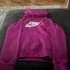 Good Condition Never Worn Nike Fleece Hoodie For Spring, Nike Spring Hoodie Sweatshirt, Trendy Nike Winter Sweatshirt, Nike Hoodie With Adjustable Hood For Fall, Nike Pink Sweatshirt For Streetwear, Pink Nike Hoodie With Crew Neck, Nike White Hoodie For Fall, Nike Pink Hoodie With Drawstring Hood, Pink Nike Long Sleeve Hoodie