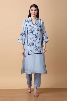 Powder blue kurta with floral print and thread embroidery. Paired with coordinating straight pant. - Aza Fashions Elegant V-neck Floral Print Kurta, Silk V-neck Sets With Printed Motifs, Spring Chikankari Embroidery V-neck Set, Cotton V-neck Sets With Resham Embroidery, Spring V-neck Chikankari Embroidered Sets, Cotton Floral Embroidered V-neck Sets, Silk V-neck Kurta With Printed Motifs, Blue Embroidered V-neck Set, Blue V-neck Kurta With Printed Motifs