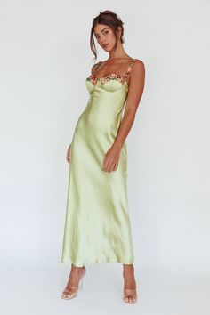 Lime midi dress Lined Padded bust Adjustable straps Zipper in back Heads will turn when you walk by in our gorgeous Rose Garden midi dress. We are in love with its pretty floral applique trim! Perfect for a wedding or birthday celebration. Team it with mules and a clutch for a romantic look we are loving. MODEL INFO Model is wearing size XS Height: 5'6" Bust: 32" Waist: 24.5" Hips: 34.5" SIZE INFO Flat garment measurements This was manually measured from the actual garment Sizing may vary by 0.5 Romantic Look, Lingerie Dress, Satin Maxi, Clothing Tags, Iron Material, Satin Maxi Dress, Floral Applique, Rose Garden, Dress Romper