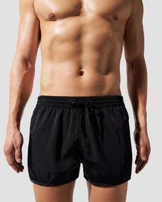 Our Swim Shorts in smooth satin twill are designed with a regular fit, short leg and mesh lining for comfort and support. Made of Econyl®—a nylon fibre repurposed from landfill and ocean waste. Regular fit, short length Inside leg length size M 6.5 cm/2.6" If between sizes, consider taking sizing down Model is 176 cm/ 5’9’’and wears size M Mesh lining for comfort and support Elastic waistband with drawstring Side seam pockets and back zip pocket for secure credit card storage Tonal embroidered C Jon Kortajarena, Mens Boxer Shorts, Mens Swim Shorts, Black Shop, Short Legs, Man Swimming, Blue Satin, Boxer Shorts, Swim Shorts