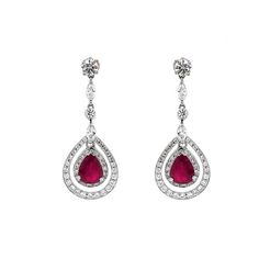 Dangling platinum earrings with red Burmese pear cut ruby 3.61 ct as center stones.  Large round diamond stones at the top are 2.05 ct.  Accent of small round and marquis diamonds are 2.02 ct. Diamonds are natural and in G-H Color Clarity VS. Platinum 950 metal.  Butterfly studs. Width: 1.6 cm Height: 4 cm Weight: 10.5 g #maxjewelryinc #jewelry #jewelries #ruby #rubies #earring #earrings #accessories #fashion #dangling #drop #luxury #diamonds #diamond #bling Formal Red Diamond Earrings With Brilliant Cut, Ruby Earrings With Brilliant Cut For Wedding, Fine Jewelry Red Diamond Earrings For Formal Occasions, Red Diamond Earrings For Formal Occasions, Wedding Ruby Earrings With Brilliant Cut, Classic Red Diamond Earrings With Brilliant Cut, Classic Red Diamond Earrings With Accents, Red Brilliant Cut Diamond Earrings For Wedding, Red Brilliant Cut Diamond Earrings Fine Jewelry