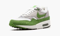 Now one of the most sought after Air Max 1’s ever, this is Patta’s famed “Chlorophyll” colorway in the original look with green denim paneling. The sneaker released for their 5th anniversary in 2009 in limited quantities, and is now becoming increasingly rare in deadstock condition. Please note: Due to the age of this product, it is subject to crumbling and/or other rapid degradation. Please wear at your own risk. Nike Air Max 2009, Urban Green Custom Sneakers With Gum Sole, Urban Style Green Custom Sneakers With Gum Sole, Urban Green Custom Sneakers For Streetwear, Green Urban Custom Sneakers For Streetwear, Urban Green Sneakers With Rubber Waffle Outsoles, Green Urban Custom Sneakers For Sports, Green Sneakers With Padded Tongue For Sports, Green Sneakers With Padded Tongue