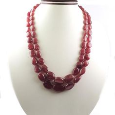 2 Lines Of Natural African Ruby Necklace - Smooth Oval Necklace - Gemstone Precious Necklace 21mmx14mm-11mmx9mm PN027Specifications:-Gemstone - African RubyShape - Oval (Smooth)Size-21mmx14mm-11mmx9mm Length - 22 InchesBeads-65+Carat-990Beautiful layered  precious long Necklace. The necklace can be adjusted according to the neck size.Amazing quality at the best price around!!! Bulk wholesale orders are welcome on this item and any others in my shop, convo me for pricing information. Oval Beads Gemstone Necklace For Gift, Oval Necklace With Natural Stones For Formal Occasions, Oval Bead Gemstone Necklace For Formal Events, Formal Gemstone Necklace With Oval Beads, Formal Oval Bead Gemstone Necklace, Faceted Oval Necklaces For Anniversary, Oval Faceted Necklace For Anniversary, Oval Gemstone Beads Necklaces For Formal Occasions, Formal Oval Gemstone Beads Necklaces