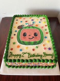 a birthday cake with an image of a television on it's face and stars around the edges