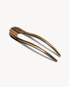 A classic French hair pin, hand-sculpted in fine Italian acetate. Recommended for all hair textures. Effortless Updo, French Pin, French Hair Pin, Hair Textures, Hoop Charms, French Hair, Summer Sunglasses, Hair Stick, Hair Sticks