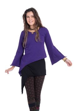 This long sleeve pixie is so comfy, made from thick stretchy cotton. The dramatic sleeves give it an enchanted feel.  SIZES  SMALL:  Bust = 32" (81 cm) Waist = 32" (81 cm) Length at Short Point = 19" (48 cm) Arm = 21" (53 cm) MEDIUM:  Bust = 34" (86 cm) Waist = 34" (86 cm) Length at Short Point = 20" (51 cm) Arm = 21" (53 cm) LARGE:  Bust = 36" (91.5 cm) Waist = 36" (91.5 cm) Length at Short Point = 20" (51 cm) Arm = 22" (56 cm) XL:  Bust = 38" (96.5 cm) Waist = 38" (96.5 cm) Length at Short Poi Purple Pixie, Dramatic Sleeves, Grand Tour, Womens Clothing Tops, Violet, Art Collection, Fashion Inspo, Bathing Beauties, Womens Tops