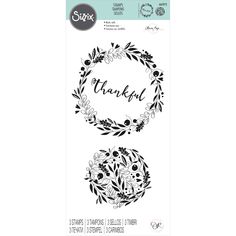 the stamp set is shown in black and white, with an image of a wreath on it