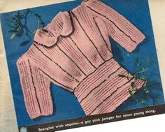 an old knitting pattern for a sweater with flowers on the front and back, in pink