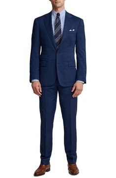 Tailored in a classic fit from Italian worsted wool, this two-piece suit presents a polished yet casual look. Jacket has front-button closure; notched lapels; three-button cuffs; chest pocket; flap pockets; interior pockets; double vents Trousers have zip fly with hook-and-bar tab closure; adjustable slider tabs; front slant pockets; back button-welt pockets Jacket is lined with 100% cupro; trousers are lined to the knee Lined 100% wool Dry clean Made in Italy Men's Designer Clothing Semi-formal Wool Pantsuit With Welt Pockets, Classic Double Breasted Suit With Suit Collar For Office, Classic Double Breasted Suit For Office, Classic Blue Suit And Tie Accessories For Work, Classic Fitted Double-breasted Suit For Work, Classic Slim Fit Double Breasted Suit For Business Casual, Fitted Double Breasted Business Casual Suit, Single Breasted Fitted Professional Suits, Blue Three-piece Suit With Welt Pockets For Business Casual