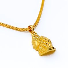 Introducing our Exclusive 22k Gold Shiv Parivar Pendant, a divine symbol of Lord Shiva and his family. This exquisite pendant is crafted from 22k gold, weighing 4.7 grams, and features intricate detailing. With a pendant length of 1 inch, it beautifully represents the essence of devotion. Please note that the chain is not included, allowing you to choose the perfect one to complement this sacred piece. PRODUCT DETAILS Gold Purity(karat): 22k Gold Weight(grams): 4.7 Item Finish: Yellow Gold Penda Ceremonial Spiritual Yellow Gold Temple Necklace, Gold Temple Necklace With Round Pendant, 22k Gold Amulet Jewelry For Rituals, Yellow Gold Pendant Temple Necklace With Locket, Yellow Gold Temple Necklace With Locket Pendant, Yellow Gold Temple Necklace With Pendant Locket, 22k Yellow Gold Temple Necklace Amulet, 22k Gold Spiritual Necklaces For Rituals, Gold Round Pendant Necklace For Puja