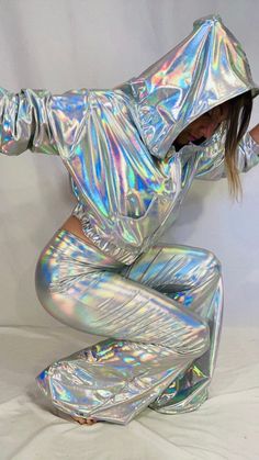 I originally made these high waisted bell bottoms for my Halloween costume last year. I was a space girl!! 👽I also wore my matching holographic zip hoodie with it. Super comfortable and it looked out of this world! Lol The fabric is spandex strong but stretchy and extremely shiny with rainbow colors. It almost hurts to look at in the sun! 😆 the bells are about 26 inches around. If you would like a pair for yourself I'd love to make you one! Message me if u have any questions. Comes in a handfu Holographic Pants, High Waisted Bell Bottoms, Space Pants, Holographic Fashion, Rave Fit, Holographic Iridescent, Rave Fits, Alien Costume, Space Outfit