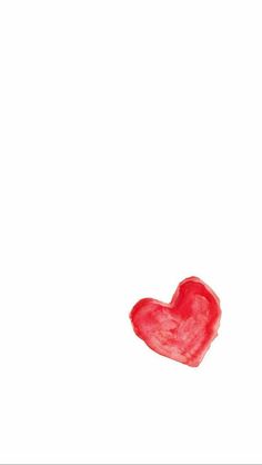 a red heart shaped object on a white background with space for the word i love you