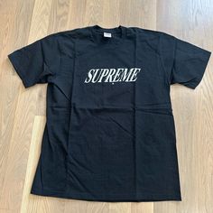 Limited Edition Supreme Shirt, Never Worn , Size Large In Men’s . Classic Logo Print Shirt For Streetwear, Classic Logo Print Streetwear Shirt, Tan Logo Print Shirt For Streetwear, Classic Shirt With Graphic Print For Streetwear, Basic Black Shirt With Logo Print, Classic Graphic Print Shirt For Streetwear, Black Tshirt Men, Supreme T Shirt, Supreme Logo