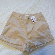 High Waisted Light Beige/Cream Colored Shorts. Summer Cotton Shorts In Neutral Color, Neutral Cotton Summer Shorts, Spring Cotton Neutral Shorts, Spring Neutral Cotton Shorts, Neutral Cotton Shorts For Summer, Fitted Shorts For Spring And Summer, Fitted Beige Shorts For Beach, Beige Fitted Shorts For The Beach, Fitted Beige Shorts For The Beach