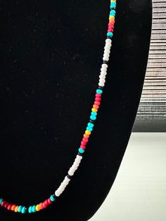 * DESIGNER BEADED NECKLACE * Glass seed beads about 3.7 mm in size * Nylon stringing cord * Bead Colors: White, Red, Turquoise, Orange< Yellow and Black * Custom lengths from 22" to 40" long - price varies per length * Clasp Options: Silver Toggle, Silver Lobster Claw or No Clasp (for lengths 24 inches and longer. * Please contact me if you have any questions regarding this item. * I would love to make this necklace for you! Native Beaded Necklace, Necklace Seed Beads, Native American Necklace, Native American Style, Beaded Jewelry Designs, Red Turquoise, Native American Fashion, Beaded Necklaces, Style Necklace