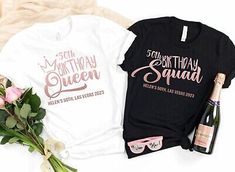 two t - shirts with pink roses and a bottle of champagne