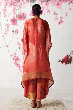 Peach asymmetric hem tunic with all over abstract prints and embellished placket. Paired with coordinating cowl pant. - Aza Fashions Summer Pant Set With Dupatta And Straight Kurta, Summer Pant Set With Straight Kurta And Dupatta, Summer Sets With Sheer Dupatta And Traditional Drape, Summer Sets With Traditional Drape And Dupatta, Traditional Drape Sets With Dupatta For Summer, Summer Traditional Drape Georgette Salwar Kameez, Bohemian Style Georgette Salwar Kameez For Summer, Bohemian Salwar Kameez With Sheer Dupatta For Summer, Summer Traditional Drape Georgette Kurta