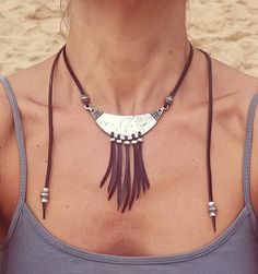 Leather Fringe Necklace for Women, leather Necklace, Statement Necklace, Statement Jewelry, Zamak Necklace belong to boho jewelry as well as bohemian jewelry, hippy jewelry carefully designed and crafted by EndiaSoul. Fashion silver bib necklace for women handmade of genuine cow leather and decorated with a silver bib, feathers and beads, all of them in silver plating of 8 microns of sterling silver. This boho necklace has adjustable fastener; a metal bead which you can move through the leather Festival Choker Necklaces With Adjustable Cord, Festival Leather Jewelry With Adjustable Cord, Festival Choker Necklace With Adjustable Cord, Lariat Necklaces With Adjustable Length For Festivals, Adjustable Lariat Necklaces For Festivals, Adjustable Length Lariat Necklaces For Festivals, Long Adjustable Necklace For Festival, Festival Necklaces With Adjustable Cord, Bohemian Nickel-free Choker Necklaces