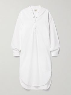 The contemporary cuts of Khaite's designs are part of what makes them so desirable. This 'Seffi' shirt dress is made from white denim for an oversized fit enhanced by dropped shoulder seams and splits along the curved hem. Adjust the snap fastenings at the neckline to create more or less coverage. Oversized White Cotton Shirt Dress, Oversized White Shirt Dress For Spring, White Relaxed Fit Shirt Dress For Work, Oversized White Shirt Dress For Fall, Jean Trench Coat, Denim Tunic, Iconic Dresses, Cardigan Shirt, Ladies Tops