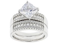 Bella Luce ® white diamond simulant 5.70ctw square, baguette, and round, rhodium over sterling silver ring with band. Measures approximately 0.81"L x 0.50"W and is not sizeable. The diamond equivalent weight is 4.22ctw. White Cubic Zirconia Rings With Baguette Diamonds, Silver Princess Cut Diamond Ring With Baguette Diamonds, White Baguette Diamond Square Cut Jewelry, Modern Princess Cut Cubic Zirconia Jewelry, White Square-cut Baguette Diamond Jewelry, White Square Cut Baguette Diamond Jewelry, Silver Cubic Zirconia Baguette Cut Wedding Ring, Silver Cubic Zirconia Baguette Cut Ring, Silver Square Cut Baguette Diamond Ring