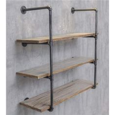 two wooden shelves with metal pipes and brackets on the wall next to eachother