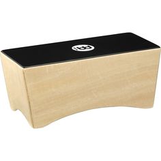 a wooden box with a black top and white bottom