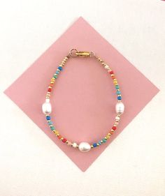 Rainbow Pearl bracelet/Freshwaterpearl and seedbeads/colour | Etsy Mixed Beads Necklace, Rainbow Pearl, Chocker Necklace, Bracelet Pearl, Oslo Norway, Sea Pearl, Beaded Choker Necklace, Sea Pearls, Colourful Necklace