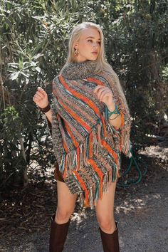 Introducing our multicolor marled knit turtle neck poncho! This cozy and warm poncho is perfect for those chilly days and nights. With its unique design, this poncho will keep you stylish and comfortable all day long. Made from a soft and comfortable fabric, this poncho is sure to become your new favorite. Whether you're out on a hike or snuggling up at home, our turtle neck poncho is the perfect accessory for any chilly day. So don't let the cold weather stop you from looking your best, order o Cozy Multicolor Poncho, Casual Multicolor Fall Poncho, Acrylic Poncho Shawl For Fall, Acrylic Shawl Poncho For Fall, Cozy Knit Poncho For Fall, Casual Multicolor Poncho For Winter, One Size Soft Knit Poncho For Fall, One Size Acrylic Poncho For Fall, Cozy Multicolor Poncho For Fall