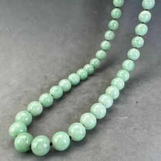 "Style: Estate Burmese jade round bead necklace, natural color fei cui, with a matching silver clasp. 58 beads Material: Natural Jadeite, jadeite, vintage, Burmese jade, green, silver clasp Method: fine polished Type: Necklace, bead necklace Size: bead size 9mm, length 23\" no.7" Jade Bead Necklace, Burmese Jade, Round Bead Necklace, Necklace Bead, Jade Necklace, Wedding Jewellery Necklace, Beaded Material, Necklace Size, Jade Beads