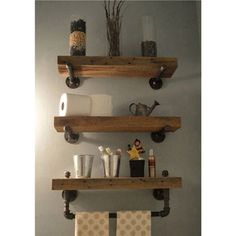 two wooden shelves above a toilet in a bathroom