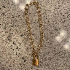 Authentic Louis Vuitton Lock (With Keys And Pouch) Made Into Necklace. I Have Never Used This Lock So It Is Brand New Louis Vuitton Lock Necklace, Louis Vuitton Necklace, Repurposed Necklace, Louie Vuitton, Button Necklace, Louis Vuitton Jewelry, Lock Necklace, Gold Link Chain, Gold Ring Sets