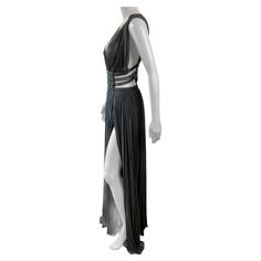 Azzedine Alaïa Semi-Sheer Cutout Ruched High Slits Gown Maxi Evening Dress FR 40 As seen on Naomi Campbell in the black color. Azzedine Alaia semi-sheer ruched dress featuring cutout sides with elastic bands and a hidden bodysuit with snap closure. Fitted Split Evening Gown, Draped Evening Dress With Side Slits, Evening Maxi Dress With Fitted Bodice And Split, Floor-length Evening Gown With Side Slits, Floor-length Gown With Side Slits For Evening Wear, Floor-length Evening Dress With Side Slits, Pre-draped Formal Evening Dress With Side Slits, Elegant Evening Gown With Split, Formal Pre-draped Evening Dress With Side Slits