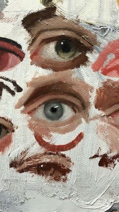 three different colored eyes are shown in this painting