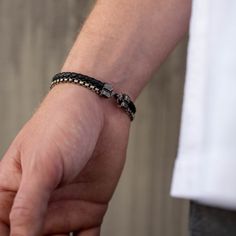 "A double men bracelet with black leather cord and oxidized sterling silver chain with a handmade hook closure, great for layering with more bracelets. The best choice for a gift for him. * Materials: High Quality Sterling Silver 925, Real Leather * Finish: Black Oxidized * Bracelet Dimensions: 20cm x 1.2cm 100% nickel free. Delivered in an elegant gift package. S H I P P I N G All orders are now shipped via FedEx Express or DHL for speed and security (delivery time to the US 3-5 days, Europe 1- Black Metal Wrap Bracelet For Gift, Adjustable Black Leather Bracelet With Lobster Clasp, Black Bracelet With Oxidized Finish As Gift, Handmade Black Stainless Steel Bracelets, Gift Black Oxidized Chain Bracelet, Black Oxidized Chain Bracelet As Gift, Adjustable Black Chain Bracelet With Lobster Clasp, Black Oxidized Finish Chain Bracelet For Gift, Black Bracelets With Sterling Silver Clasp